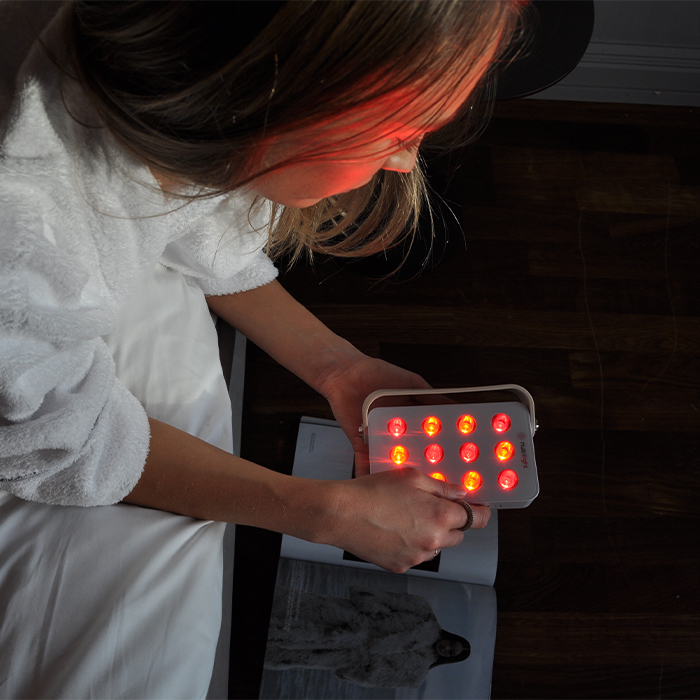 R&oslash;dlyslampe i bruk